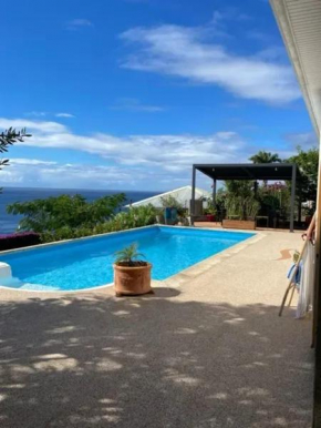 Studio cosy avec vue sur mer à Case-Pilote, 21 m², piscine